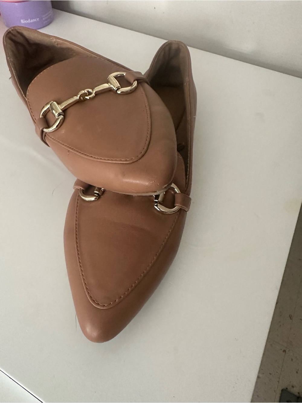 Report Women's Pointed Toe Slip-Ons in Brown with Gold Chain